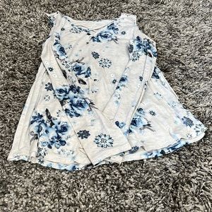 Brand - Justice    Pink shirt with tassel hanging down. Blue shirt with flowers